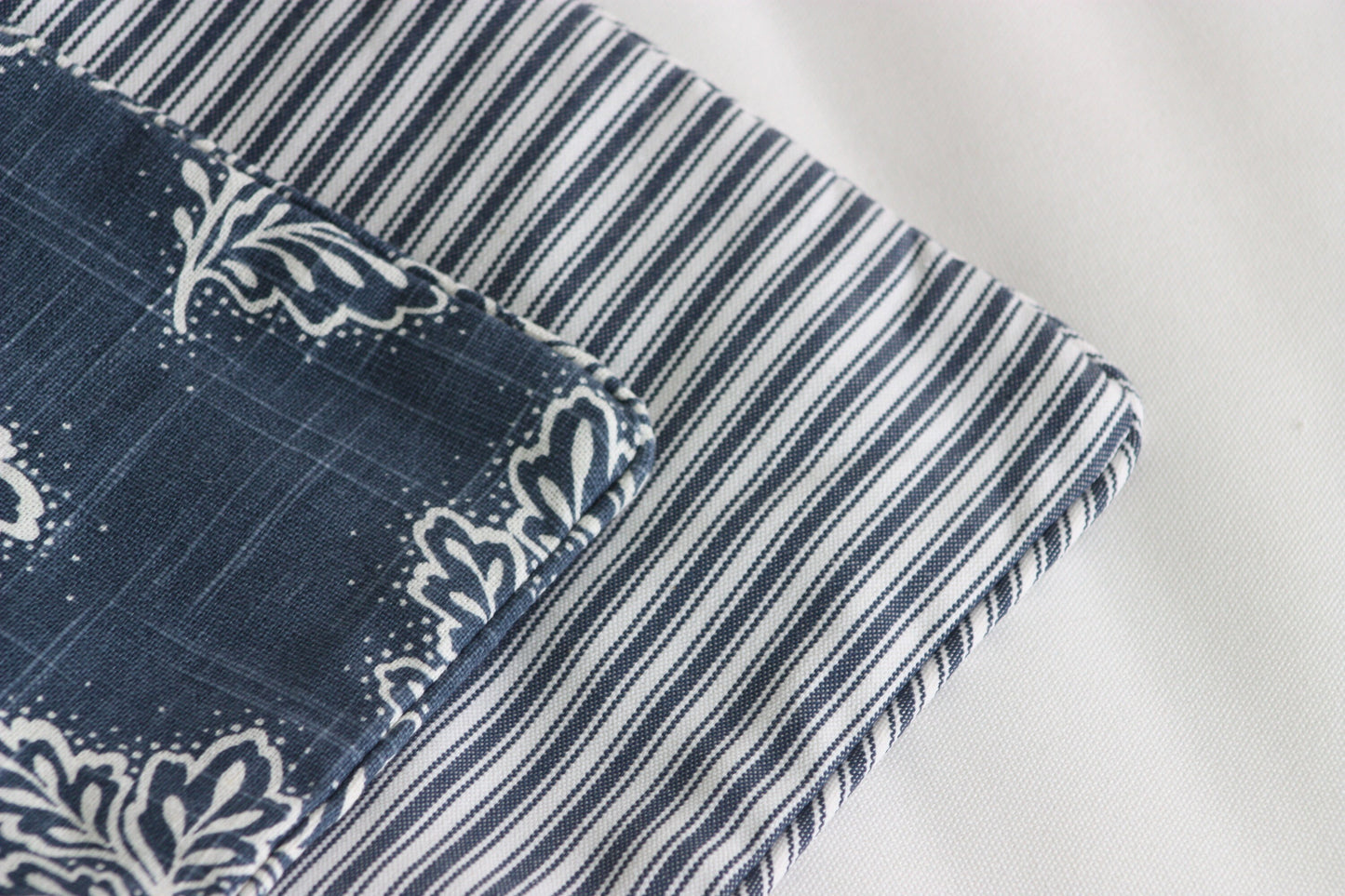 Navy Leaf falling cushion covers Warwick Fabrics