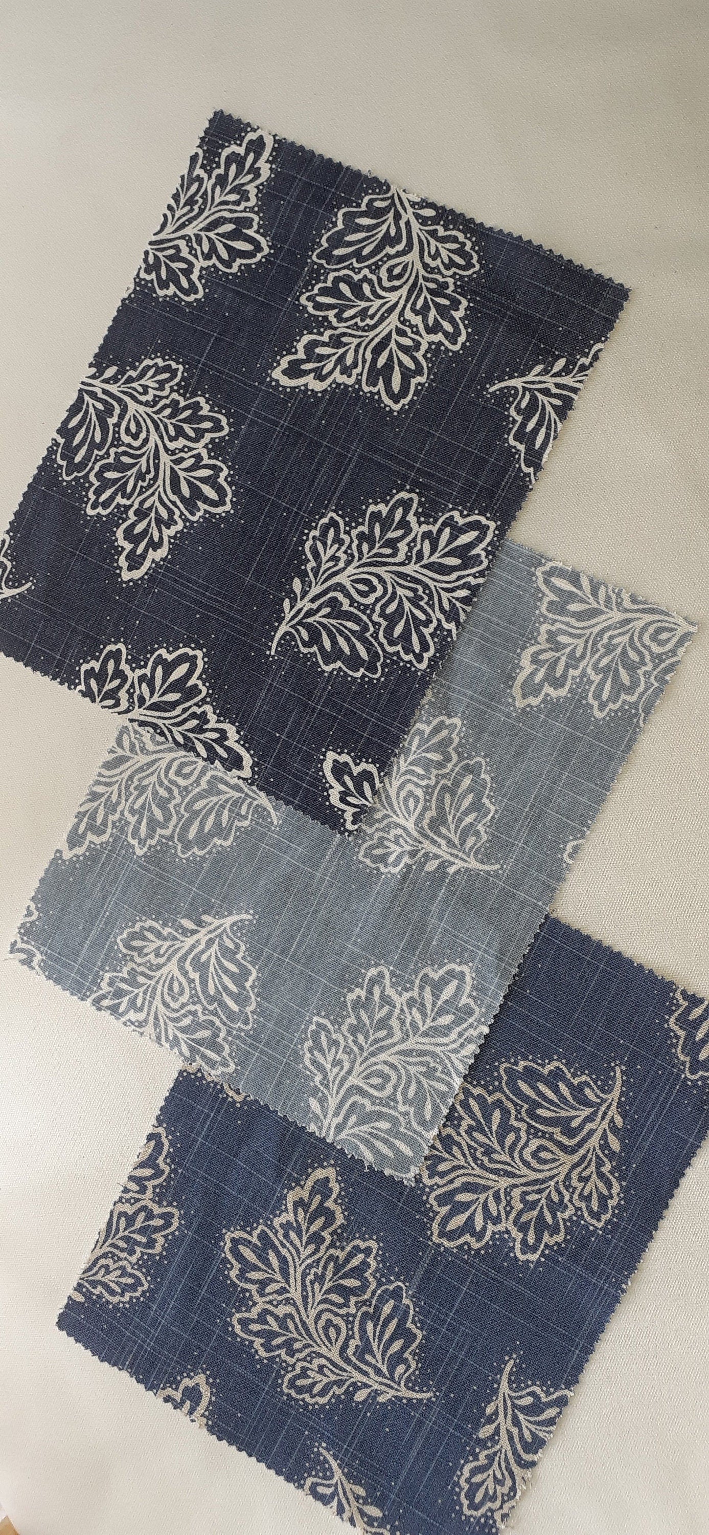 Navy Leaf falling cushion covers Warwick Fabrics